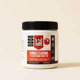 Turkesterone Old School 60 capsulas, angulo 3/4, fondo crema
